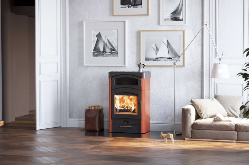 Pallas Back stove ambiance photo with ceramic cladding with wood drawer