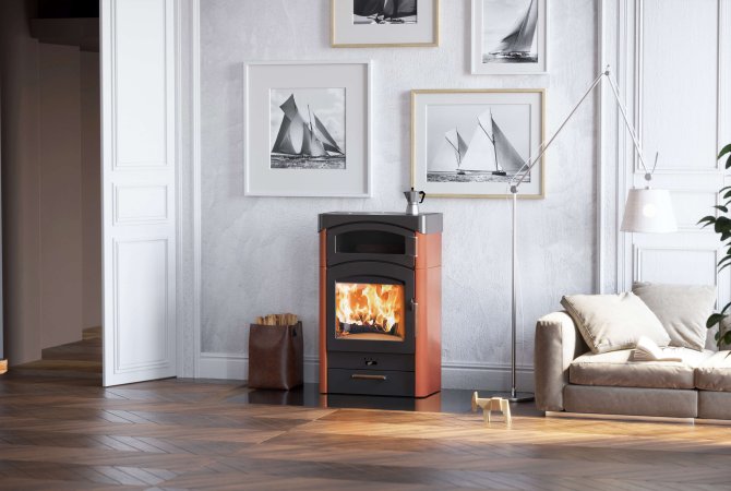 Pallas Back stove ambiance photo with ceramic cladding with wood drawer