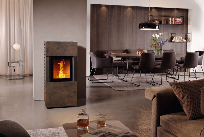 Percy pellet stove ambiance photo with ceramic cladding Corten iron